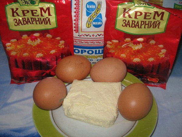 Эклеры с заварным кремом.Ингредиенты для теста мука - 1 стакан, яйца - 4 шт, вода - 1 стакан, ... - 2