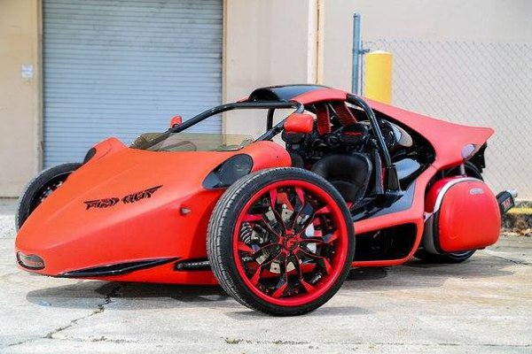 Matte-Red Trio Wrapped by TaTe Design. Dodge Charger, BMW 7 Series and a T-Rex 3Wheeler. - 4