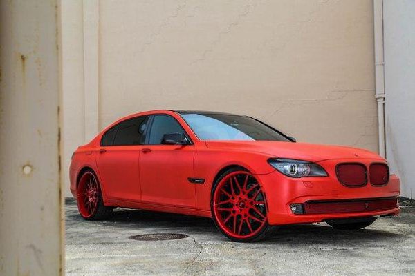 Matte-Red Trio Wrapped by TaTe Design. Dodge Charger, BMW 7 Series and a T-Rex 3Wheeler. - 2