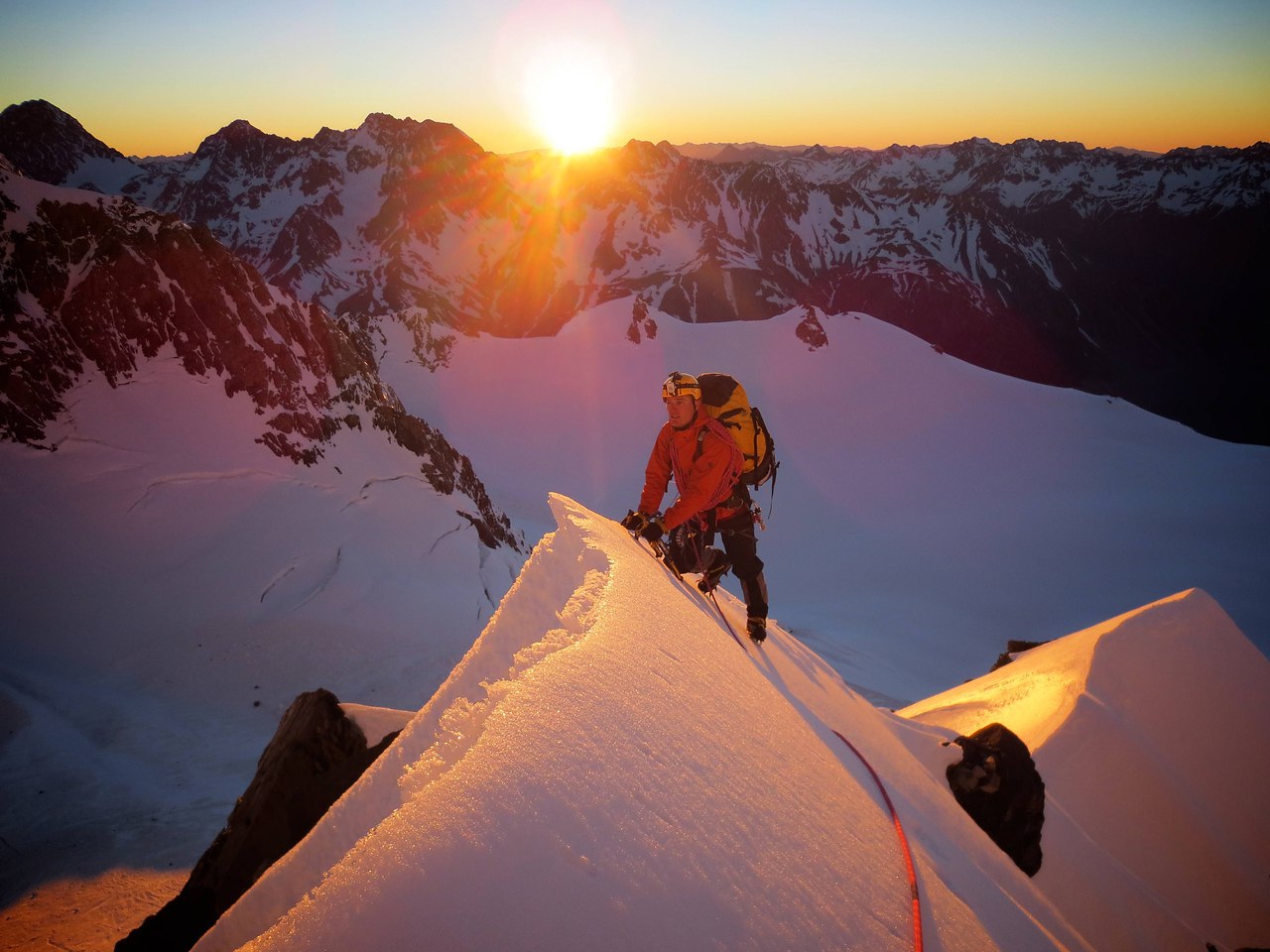 Sunrise ascent on North Shoulder, Mt. Tasman, NZ by Jim Barraud