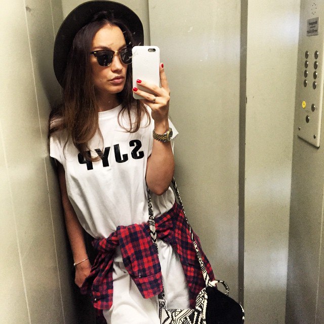 Grumpy V and a hat. Hat: #topshop Sunglasses: #rayban Dress: #sjyp Shirt: #currentelliott Backpack: ...