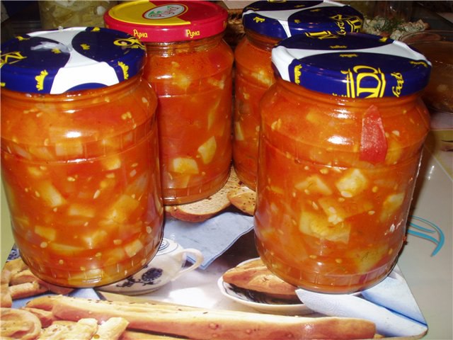 Салат из кабачков с помидорами.2 кг помидорок2 кг кабачковпол - кило лука (смесь обычного и ...