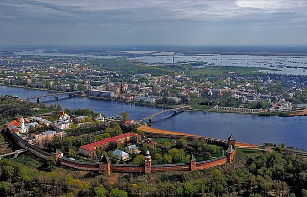Касаясь трех великих океанов, Она лежит, раскинув города, Покрыта сеткою меридианов, Непобедима, ...
