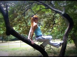     . Stretching exercises near the tree.