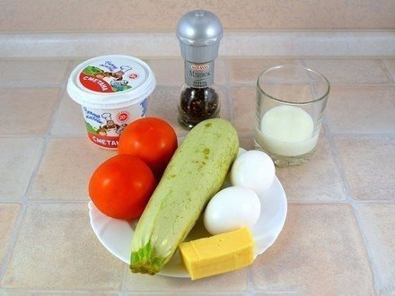 Запеченные кабачки и помидоры с сыром. Ингредиенты: 1 кабачок 2 помидора 30 г сыра 2 яйца 3 ст.л. ... - 2