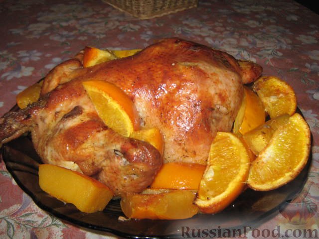 Курица, запечённая с апельсинами и тыквой.Нарядное и вкусное блюдо. Апельсины и тыква придают ...