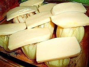 Картофель «Дофинэ».Ингредиенты:- 9 шт. картофеля, средних, одинаковой величины- 9 ч. л. сливочного ... - 3