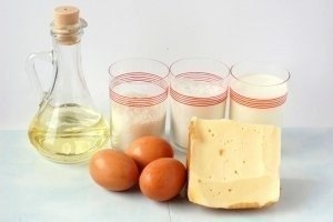 Сырные блины.Ингредиенты:30 мл масло подсолнечное рафинированное250 мл молоко1 ст. мука пшеничная2 ... - 2