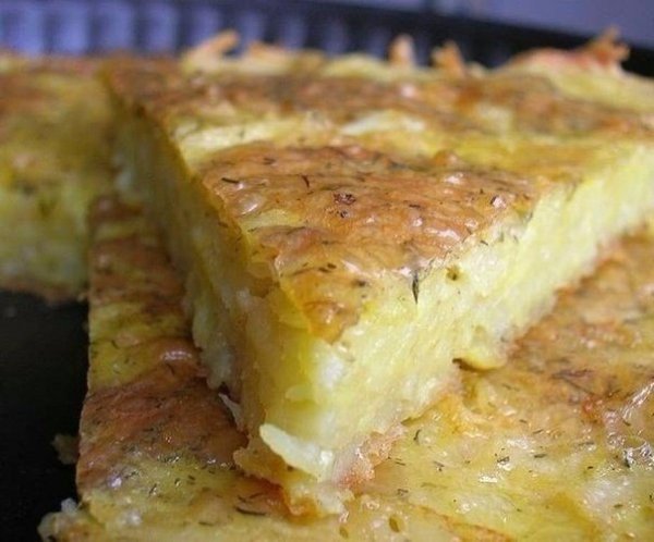Запеканка из тертого картофеля с сыром и чесноком.Это блюдо стало одним из моих любимых еще в ...