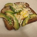 Breakfast from bread with backed avocado, egg and cheese 
October, 2017    
