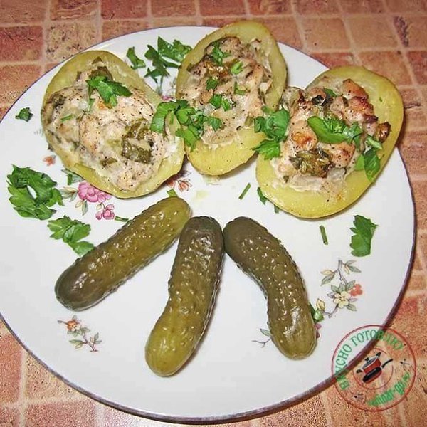 Картофельные лодочки, фаршированные мясом.Ингредиенты:Куриное филе — 500 гПетрушка — 1 пучокЧеснок — ...