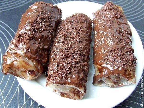 Вьетнамские блинчики с бананами и шоколадом.Ингредиенты:Банан - 2-3 шт.Грецкие орехи - 50 гСливочное ...