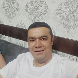 Olim Zayniddinov, 34, 