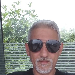 Luciano, 52, 