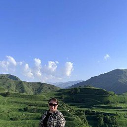 Dinara, 40, 