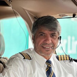 Pilot Ahmed, 60, 
