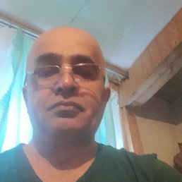 Kurbon Ali, 49, 